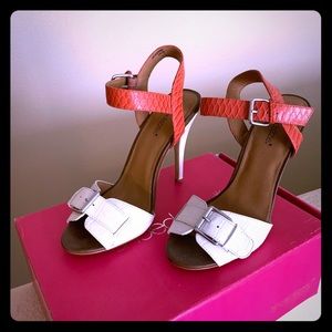 WHITE AND ORANGE HEELS